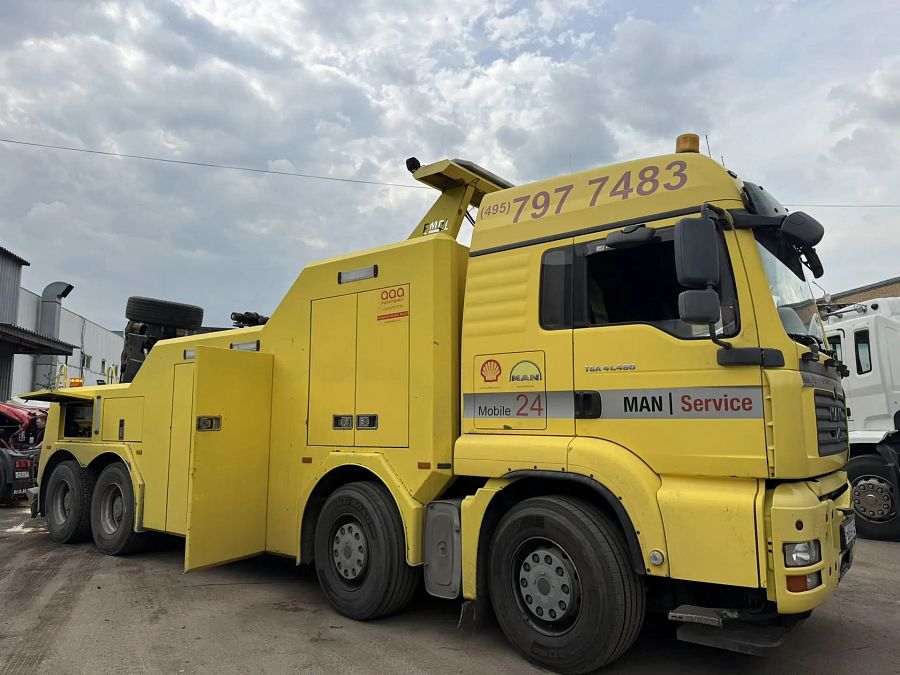 Жёлтый эвакуатор MAN Service
